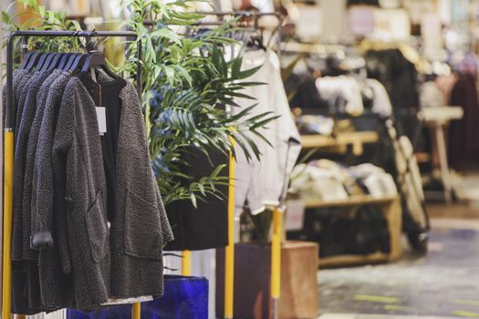 A Row Of Clothes Hanging On A Rack In A Store — Shop Fittings Office Furniture Materials Handling In Gosford, NSW