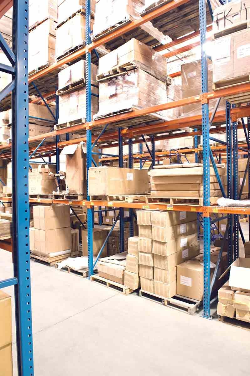 A Large Warehouse Filled With Lots Of Boxes — Shop Fittings Office Furniture Materials Handling In Smithfield, NSW