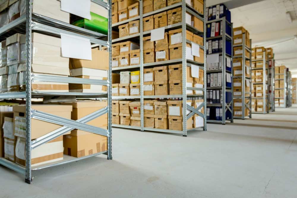 A Warehouse Filled With Lots Of Shelves — Shop Fittings Office Furniture Materials Handling In Gosford, NSW