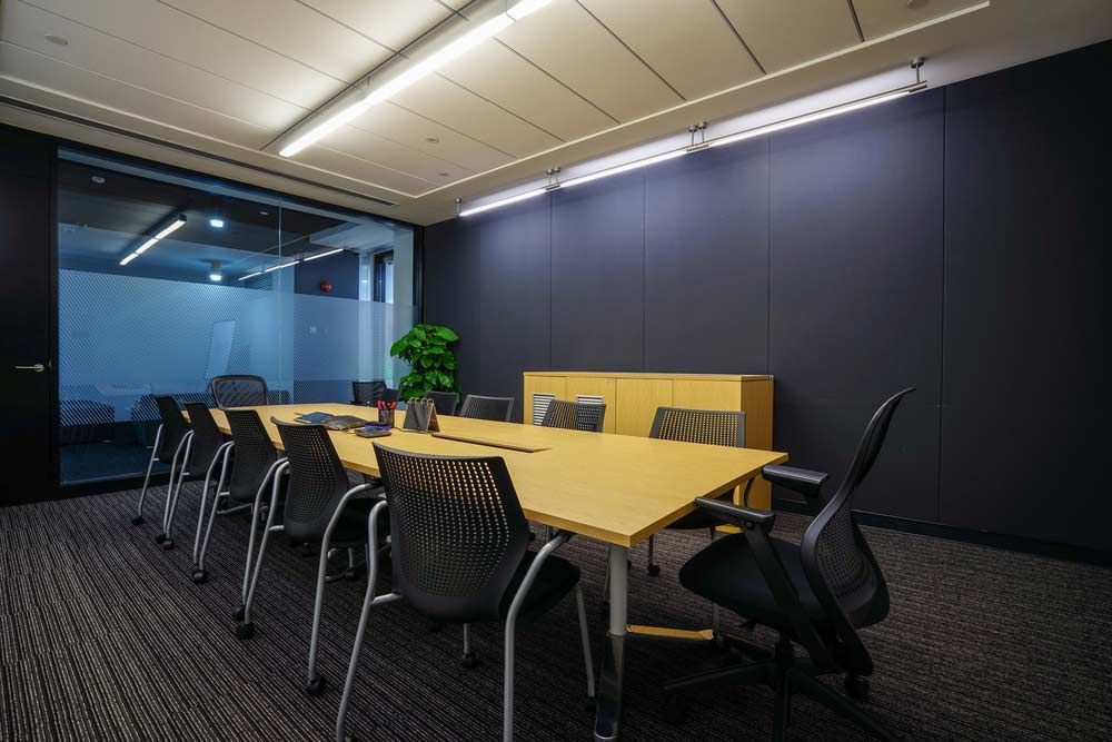A Conference Room With A Dark Feature Wall — Shop Fittings Office Furniture Materials Handling In Gosford, NSW