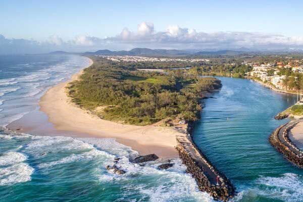 An Aerial View Of A Beach And A River — Shop Fittings Office Furniture Materials Handling In Eastern Creek, NSW