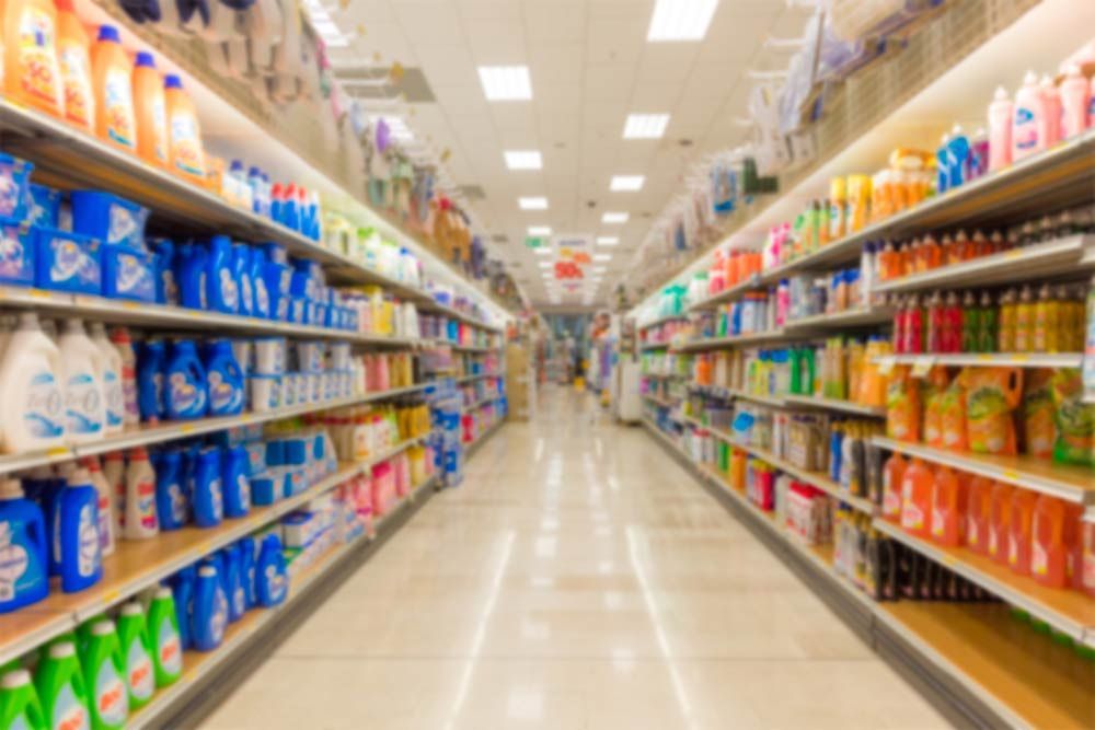 A Blurred Image Of A Supermarket — Shop Fittings Office Furniture Materials Handling In Gosford, NSW