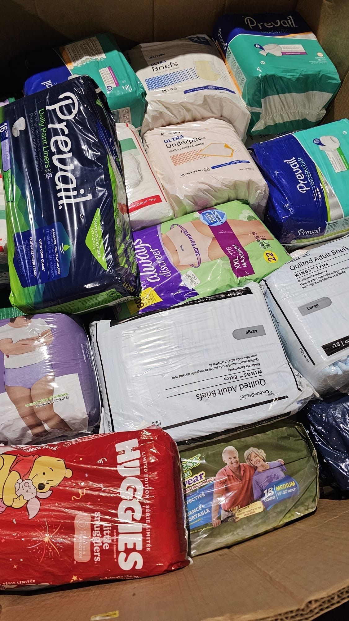 A box filled with lots of diapers and wipes.