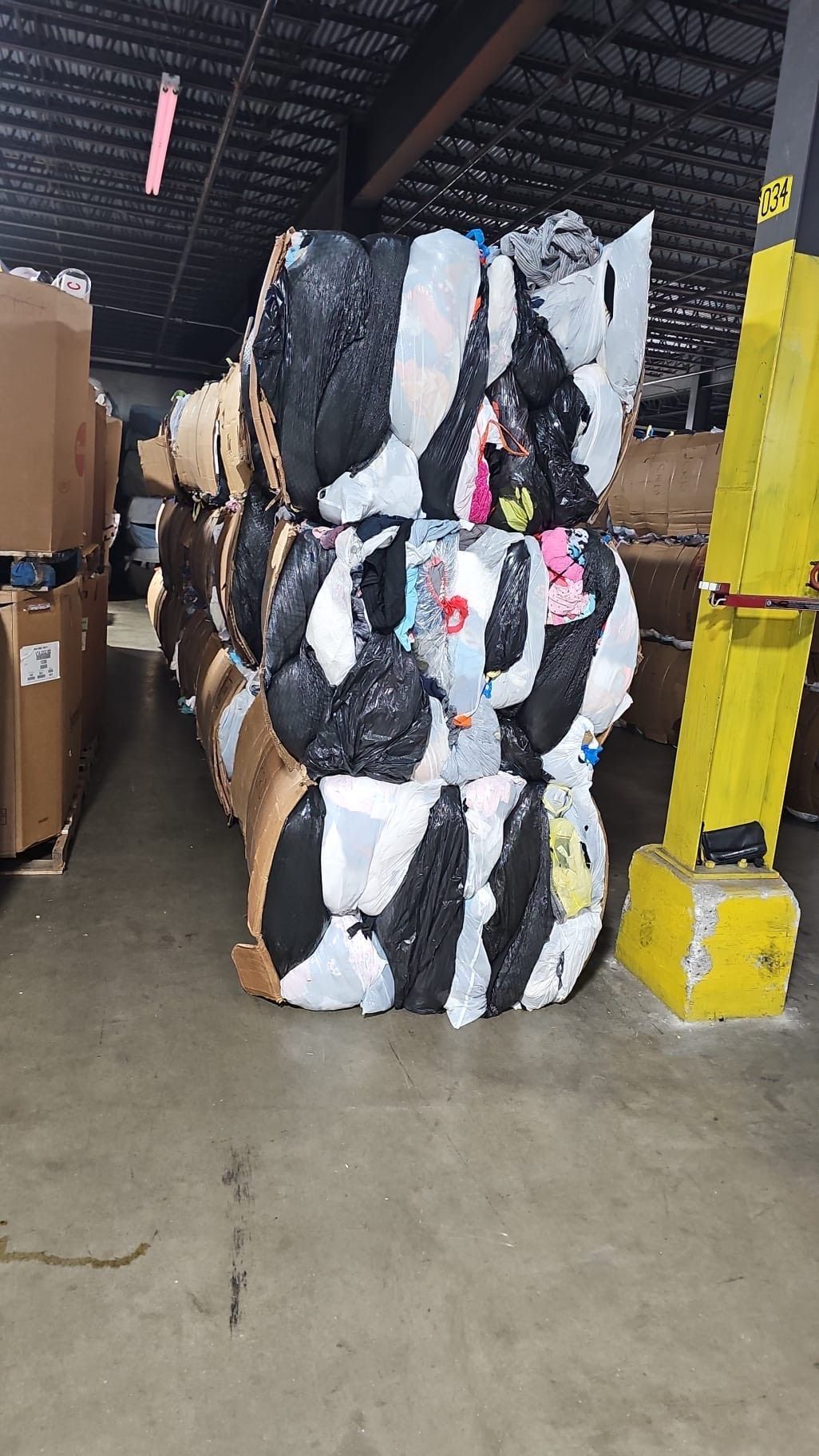 A warehouse filled with lots of stuffed animals and boxes.