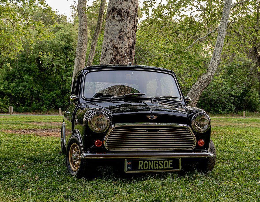 Seth from Detail Docs laying down Clear Bra Film on a Tesla Model S