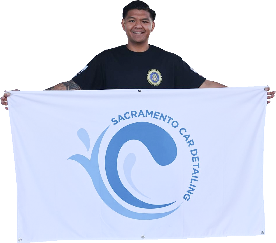 man holding a logo banner