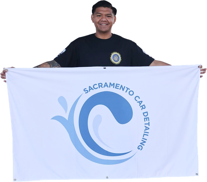man holding a logo banner