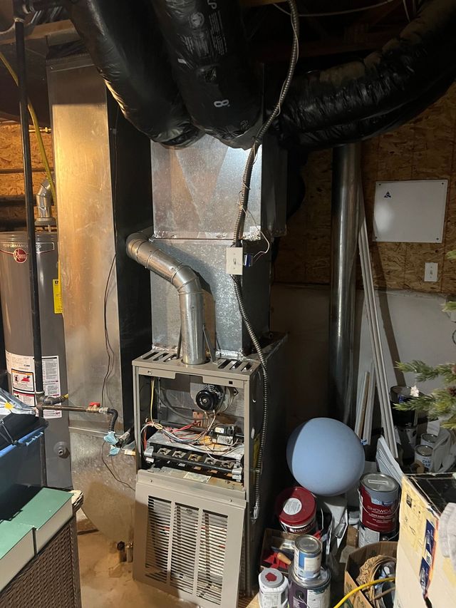 Comfy Castle Heating and Air — real thermostat & air quality job-site photo