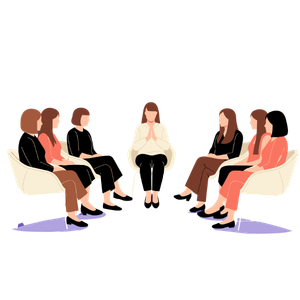 Group seated in a circle during a discussion, with a facilitator in the center
