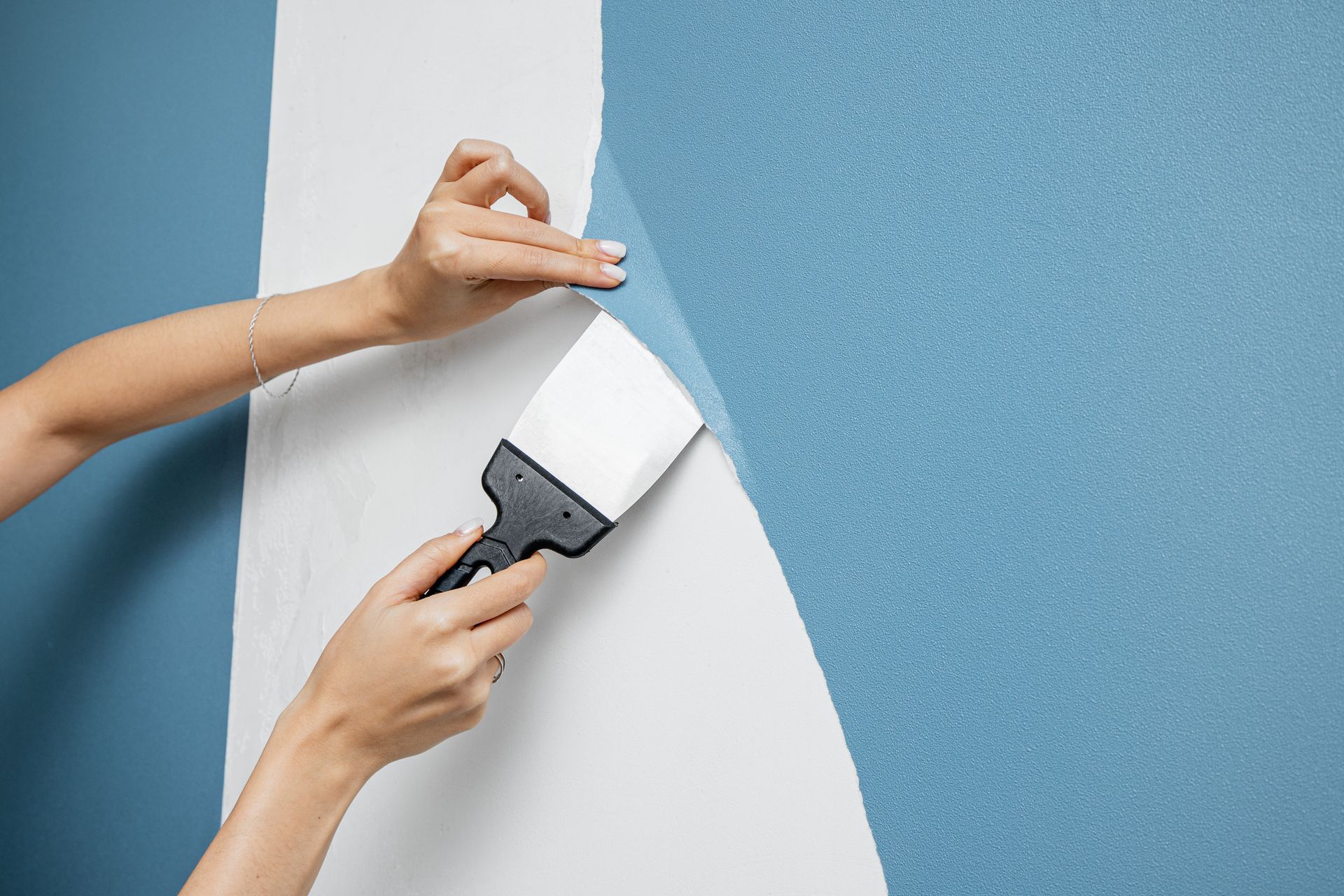 removing wall paper before you paint