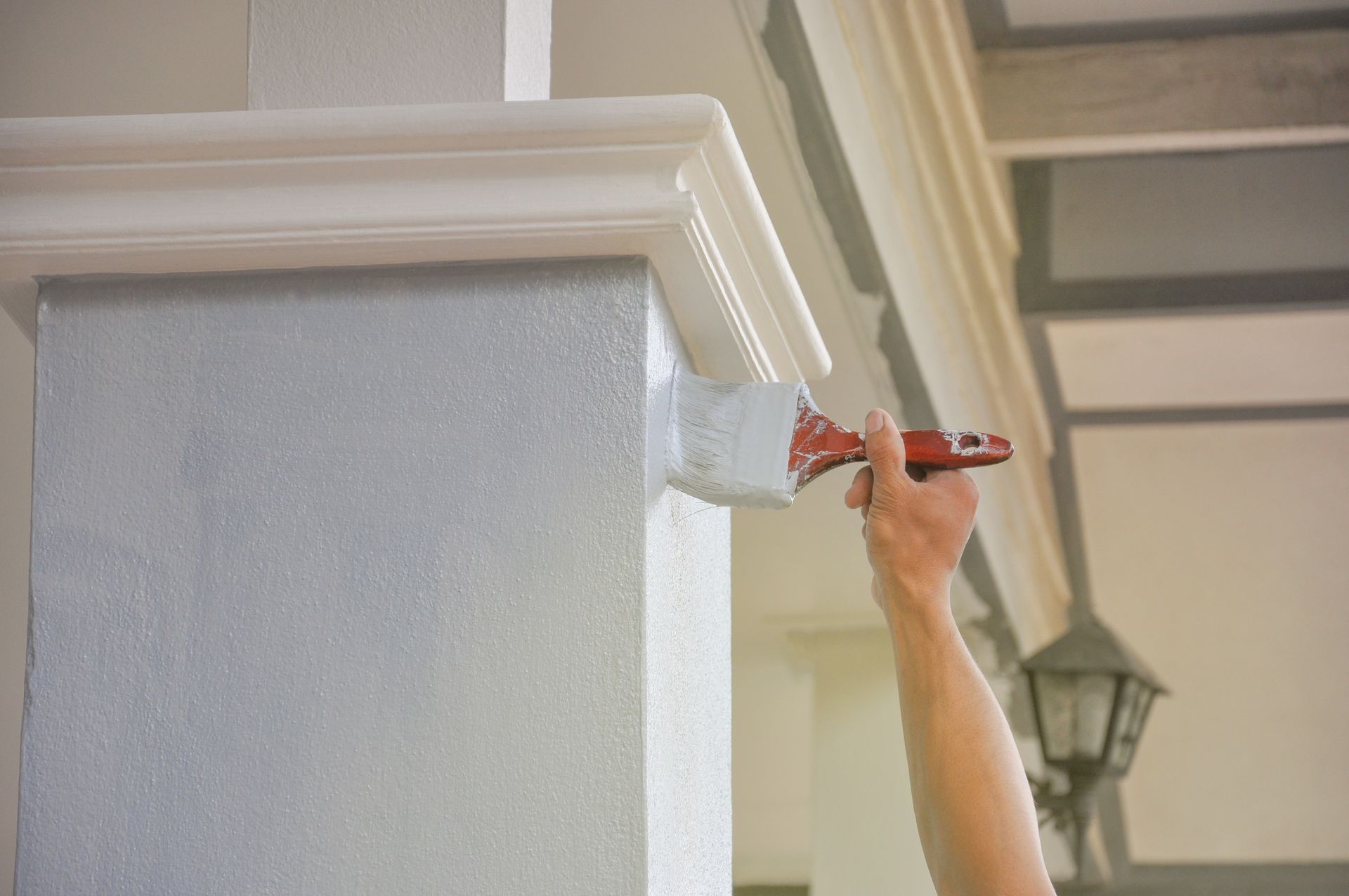 Painting the trim of a commercial property  