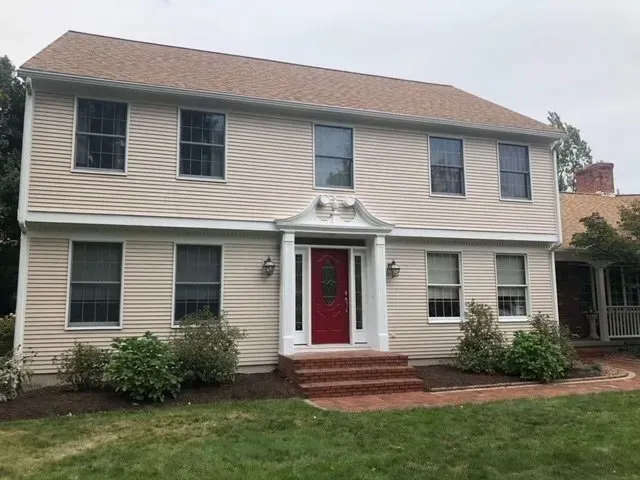 Residential home painting tan home in Western MA by Pioneer Painters