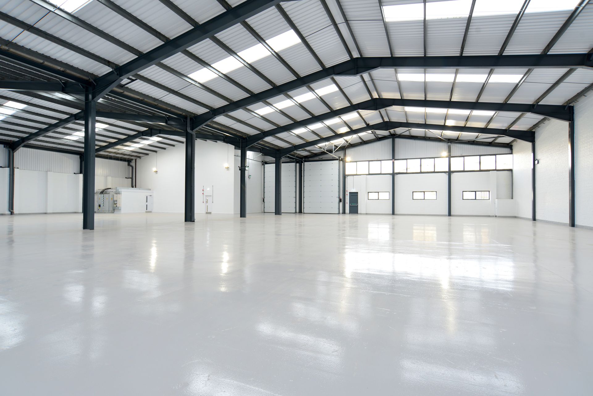 painted warehouse including interior ceilings, walls, beams and floor