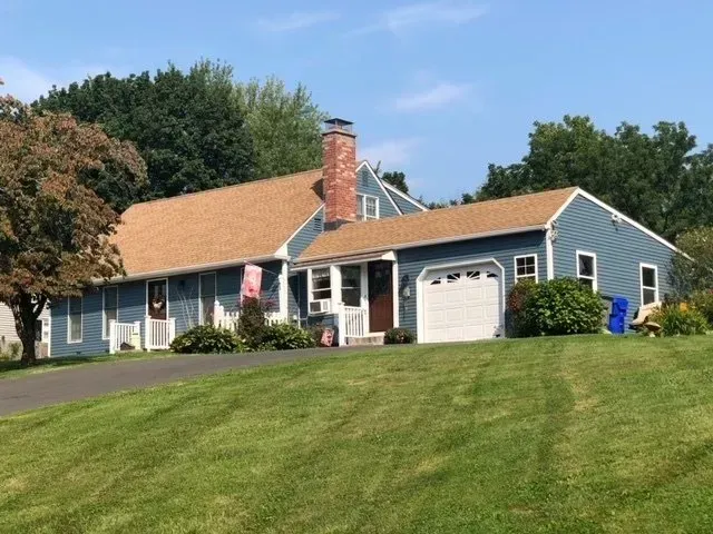 Residential exterior home painting project painted in blue in Western MA