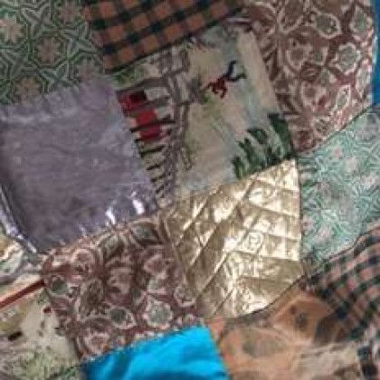 A close up of a patchwork quilt