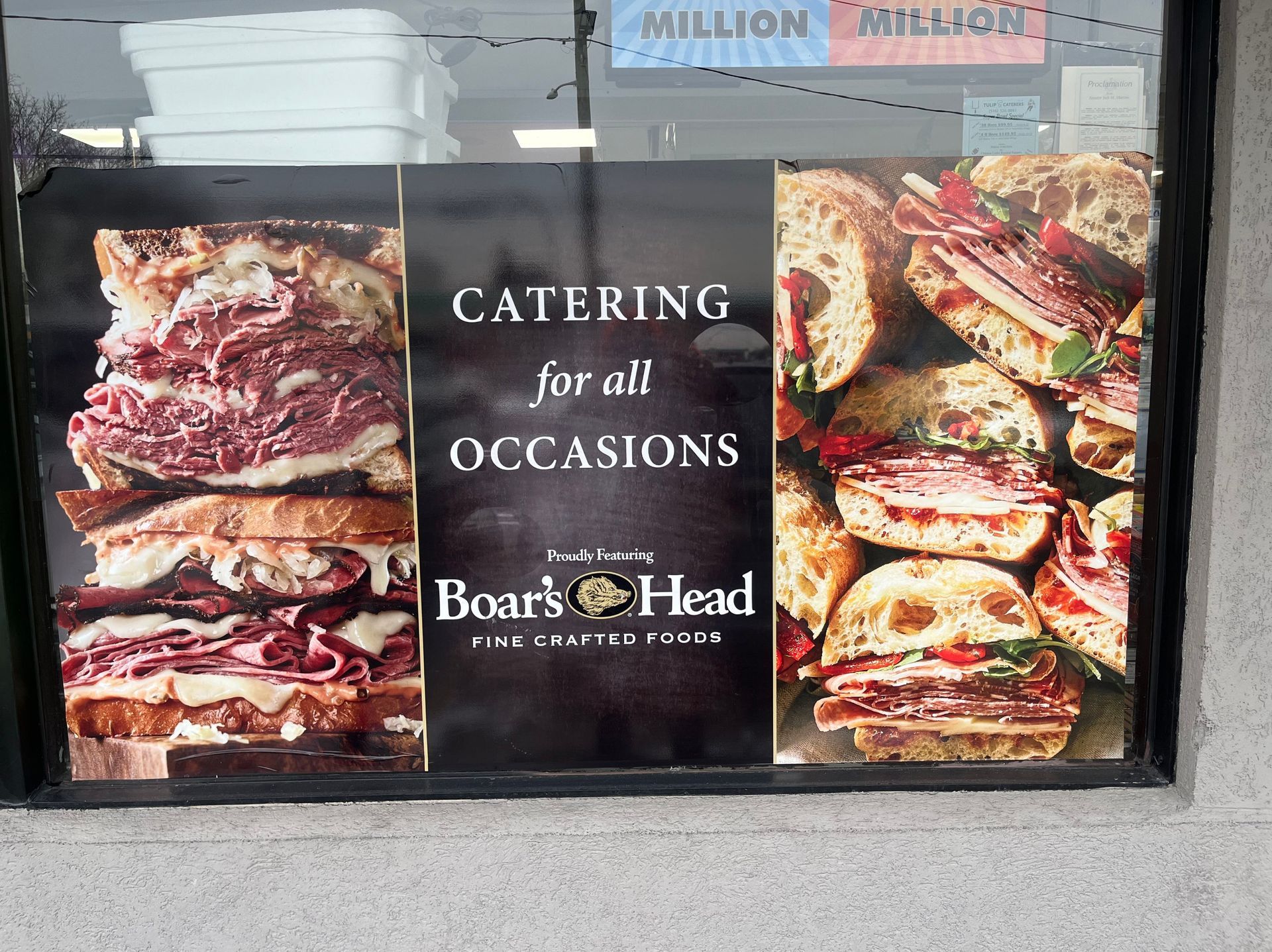 Catering poster seen through window
