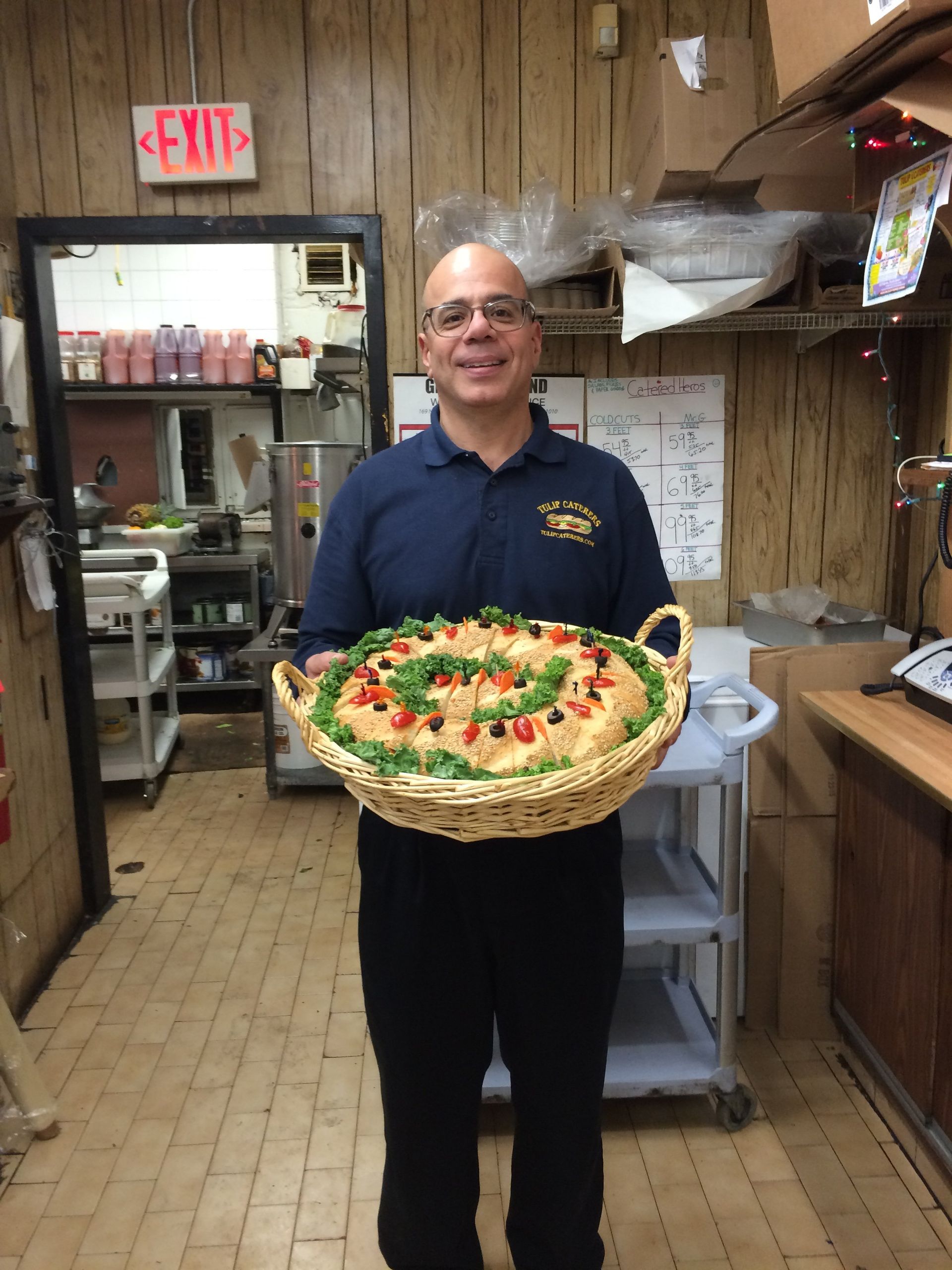 crew holding basket of food