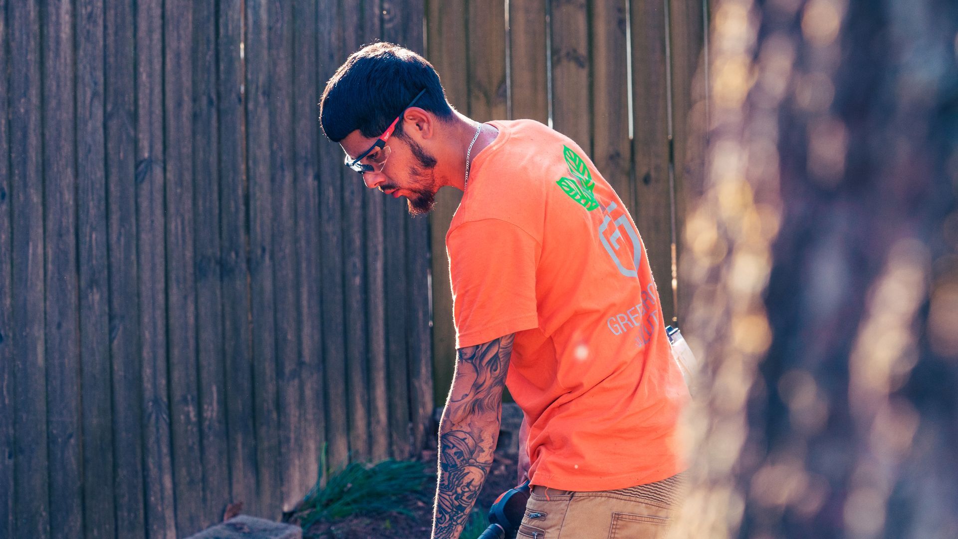 landscaper working on a persons backyard