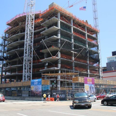 A building under construction with a sign that says ab on it