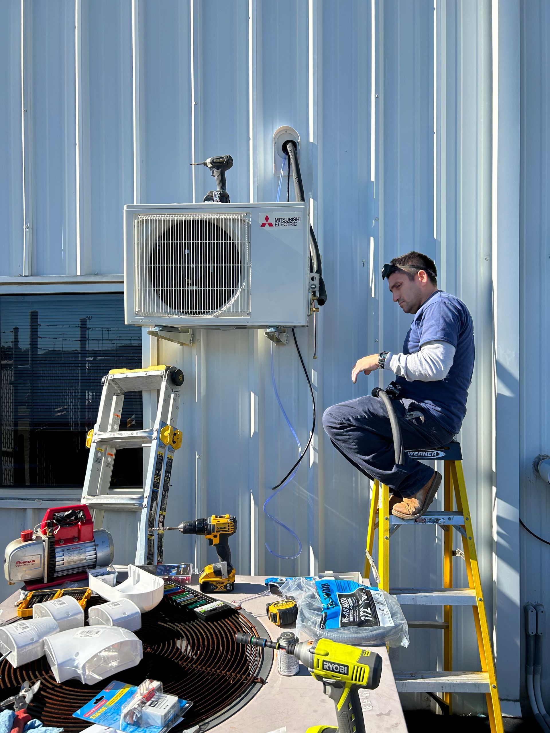 Air conditioner unit outside of a house.