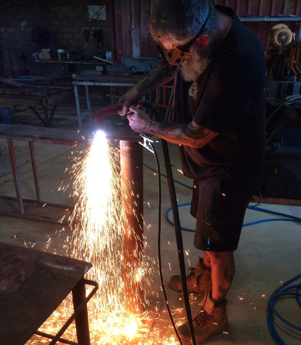 Sparks Flashing while Grinding Metal — Arc Attack Fabrication in Woolgoolga, NSW