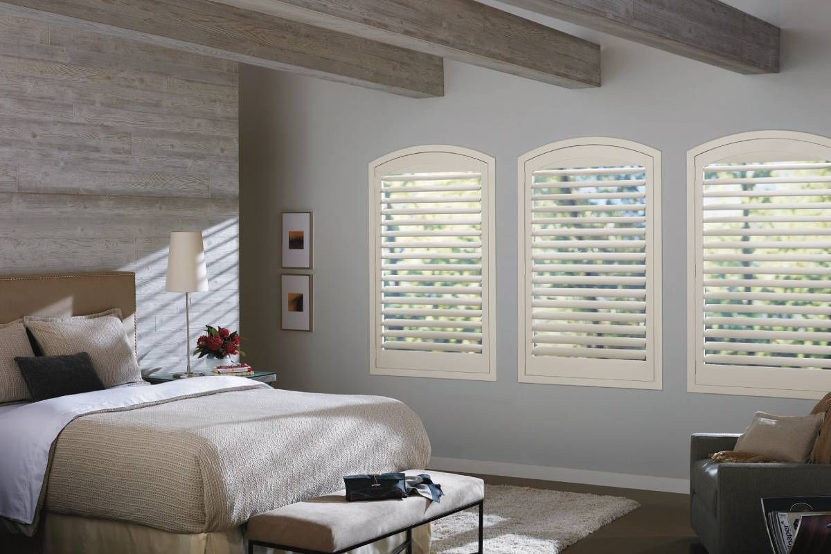 Hunter Douglas NewStyle® Composite Shutters on an arched window near Atlanta, Georgia (GA)