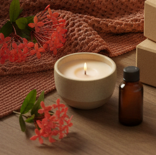 Ixora flower with candle at Ixora wellness collective