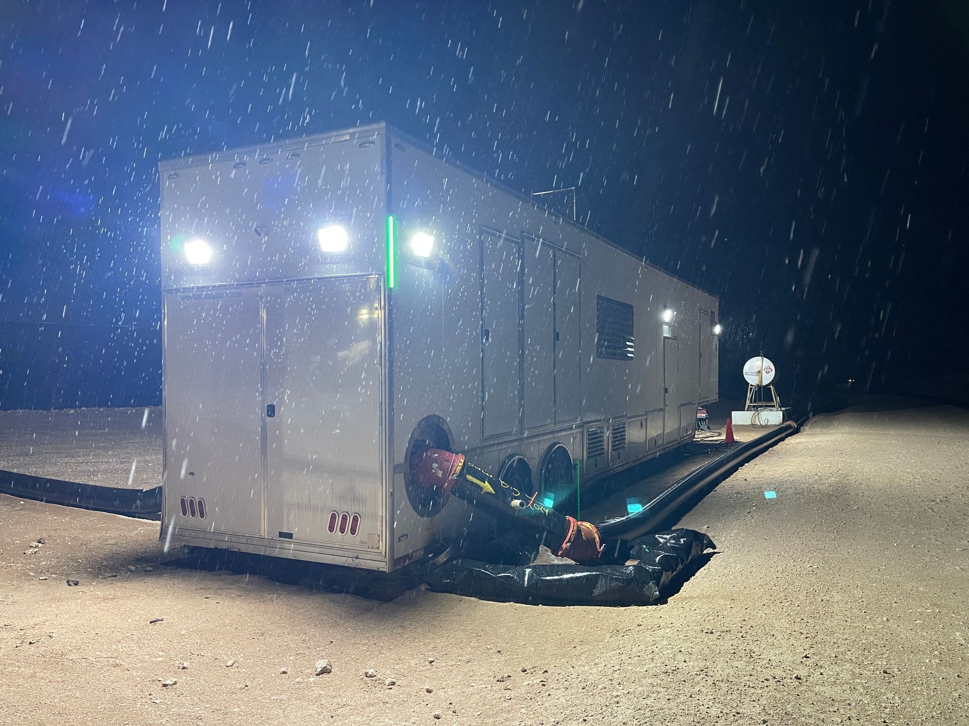 a Pesco employee wearing a welding mask is welding a pipe