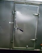 Curbside door showing damage