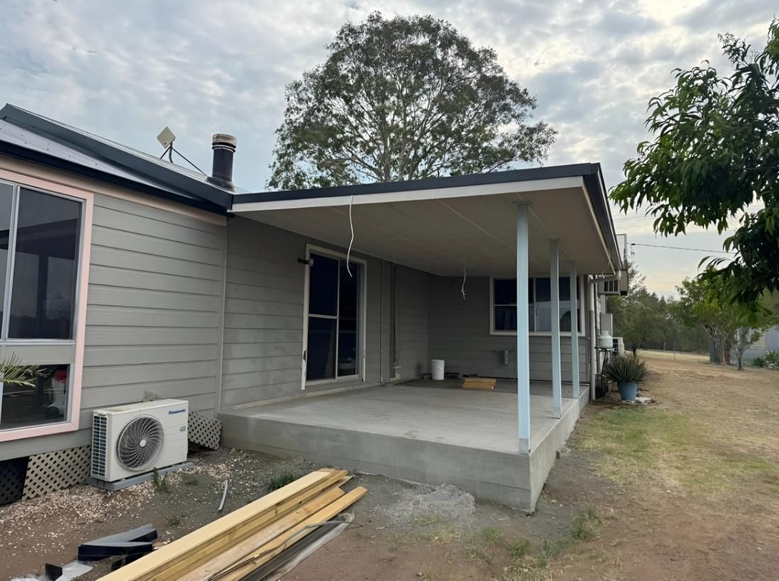 House With a Covered Porch and a Lot of Windows — TM Built Construction In Singleton, NSW