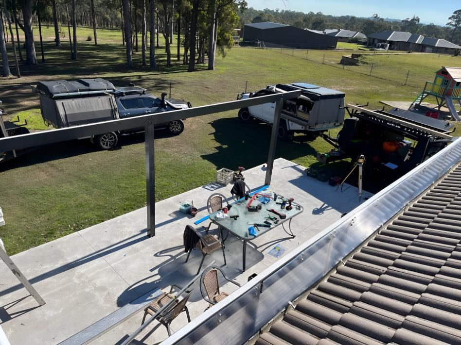 Rooftop View of a Patio With a Table and Chairs — TM Built Construction In Maitland, NSW