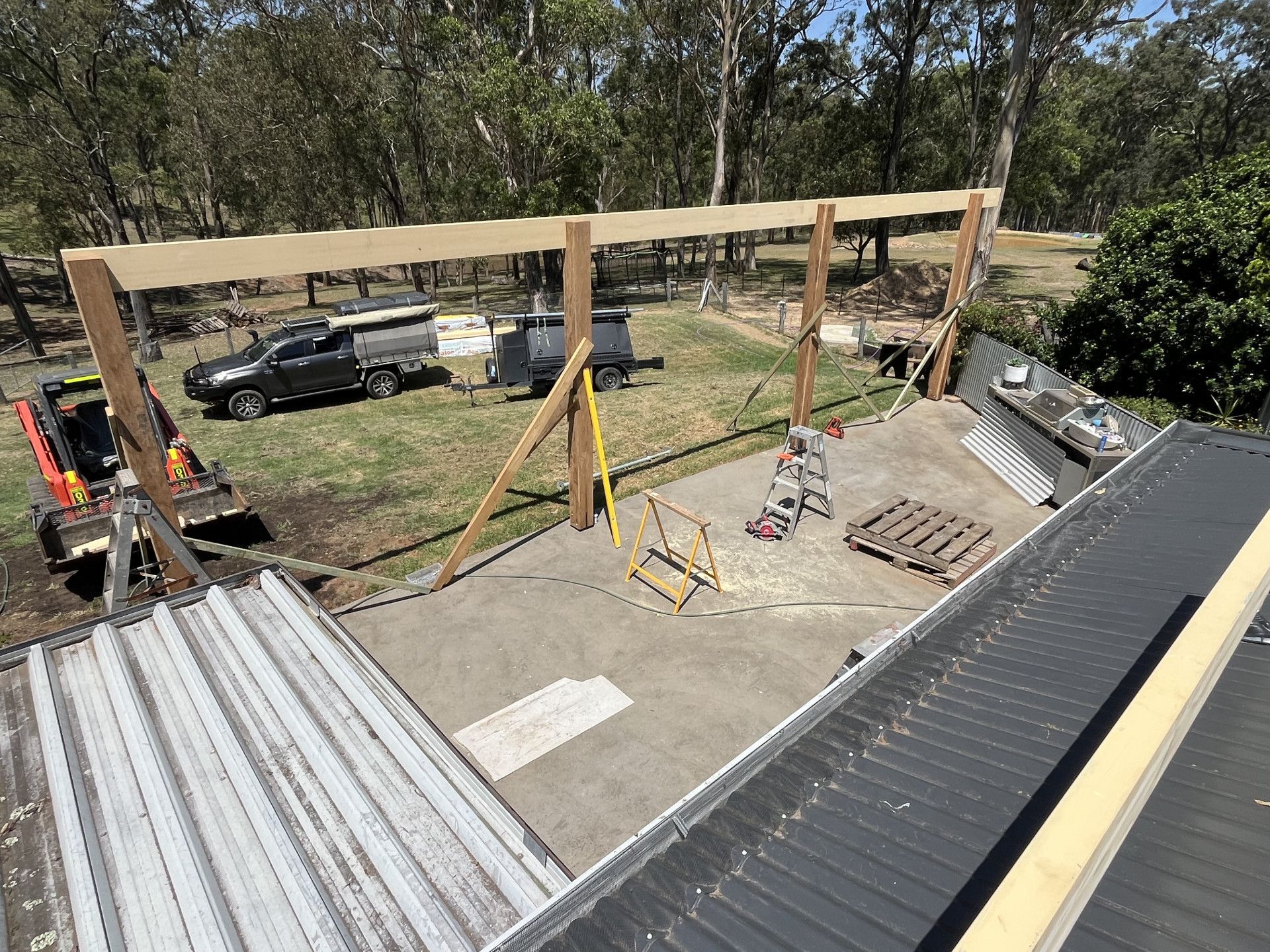 Aerial View of a Roof With a Wooden Structure — TM Built Construction In Lochinvar, NSW