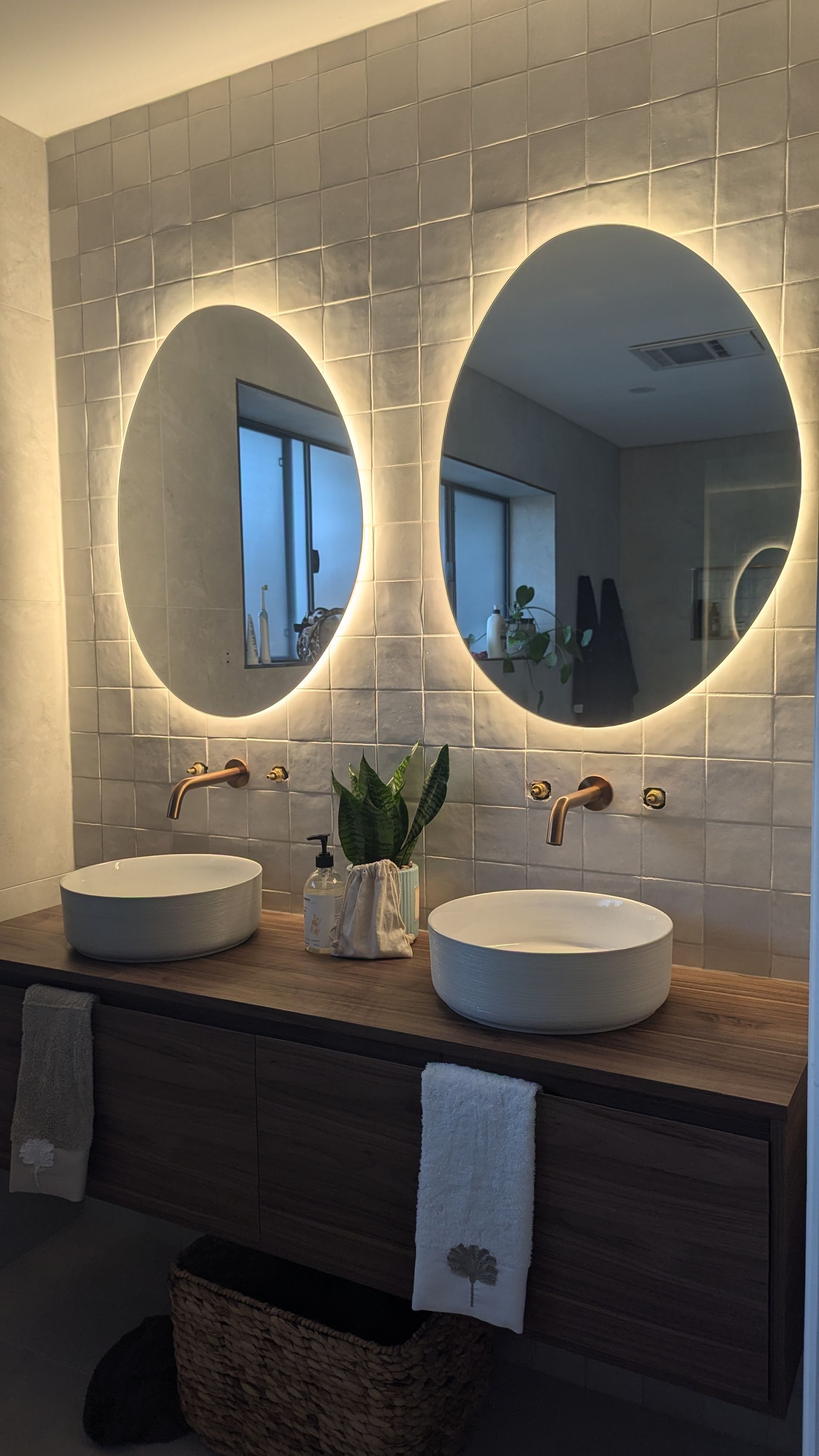 A Bathroom With Two Sinks and a Walk in Shower — TM Built Construction In Lochinvar, NSW