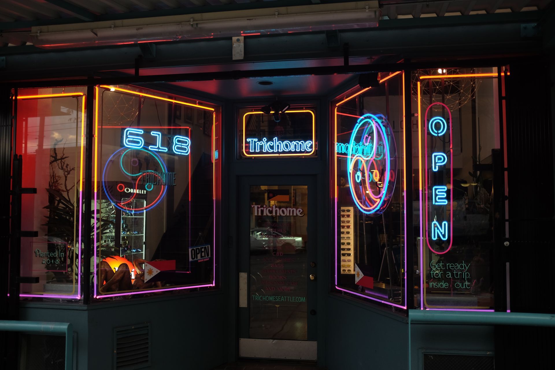 Neon-lit shop entrance: 