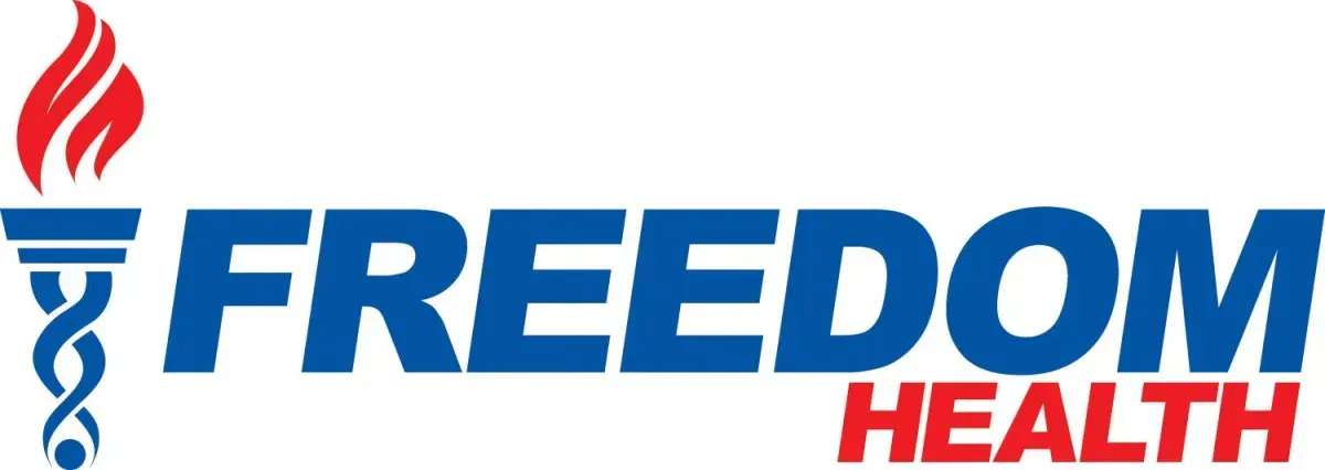 A blue and red logo for freedom health