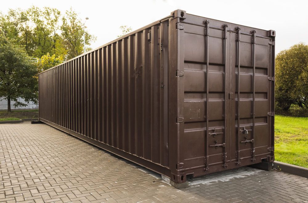 Large Brown Shipping Container in a Lot — East Coast Containers Shipping Containers and Transport in Sunshine Coast, QLD