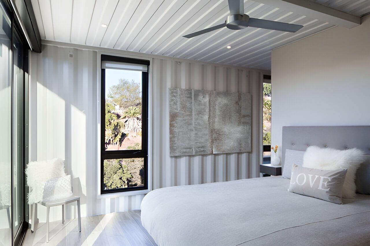 Bedroom with Large Bed and Ceiling Fan — East Coast Containers Shipping Containers and Transport in Sunshine Coast, QLD