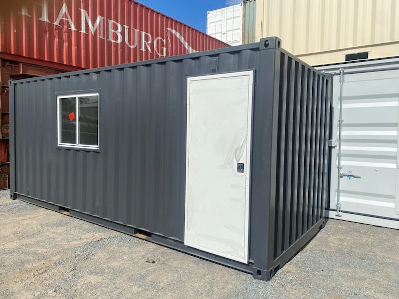 Gray Shipping Container Modified With a Window and Door, Likely for Use as an Office or Storage — East Coast Containers Shipping Containers and Transport in Chevallum, QLD