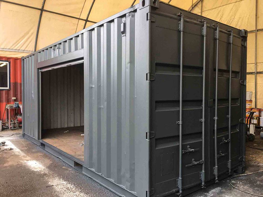 Gray Shipping Container with Open Door — East Coast Containers Shipping Containers and Transport in Gympie, QLD