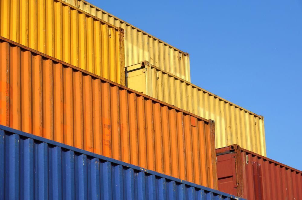 Shipping Containers Stacked in a Row — East Coast Containers Shipping Containers and Transport in Sunshine Coast, QLD