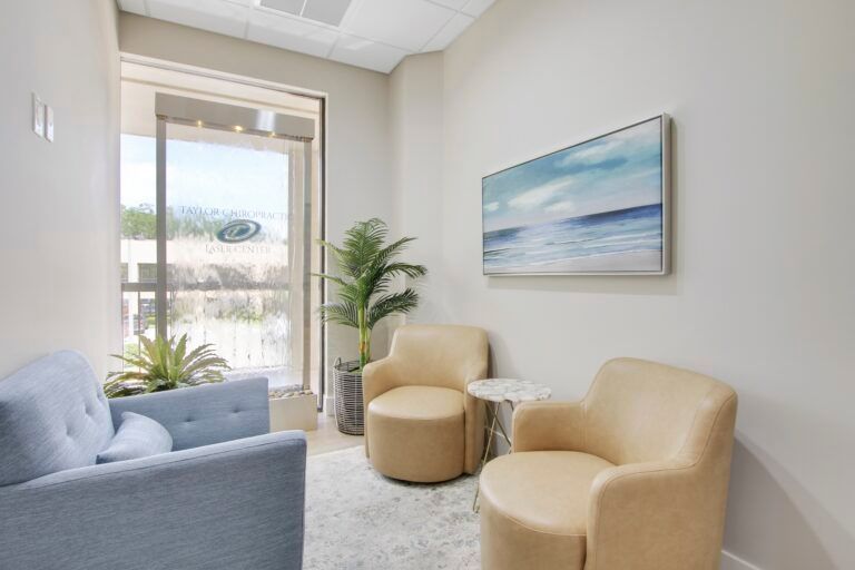 There are two chairs and a couch in the room.