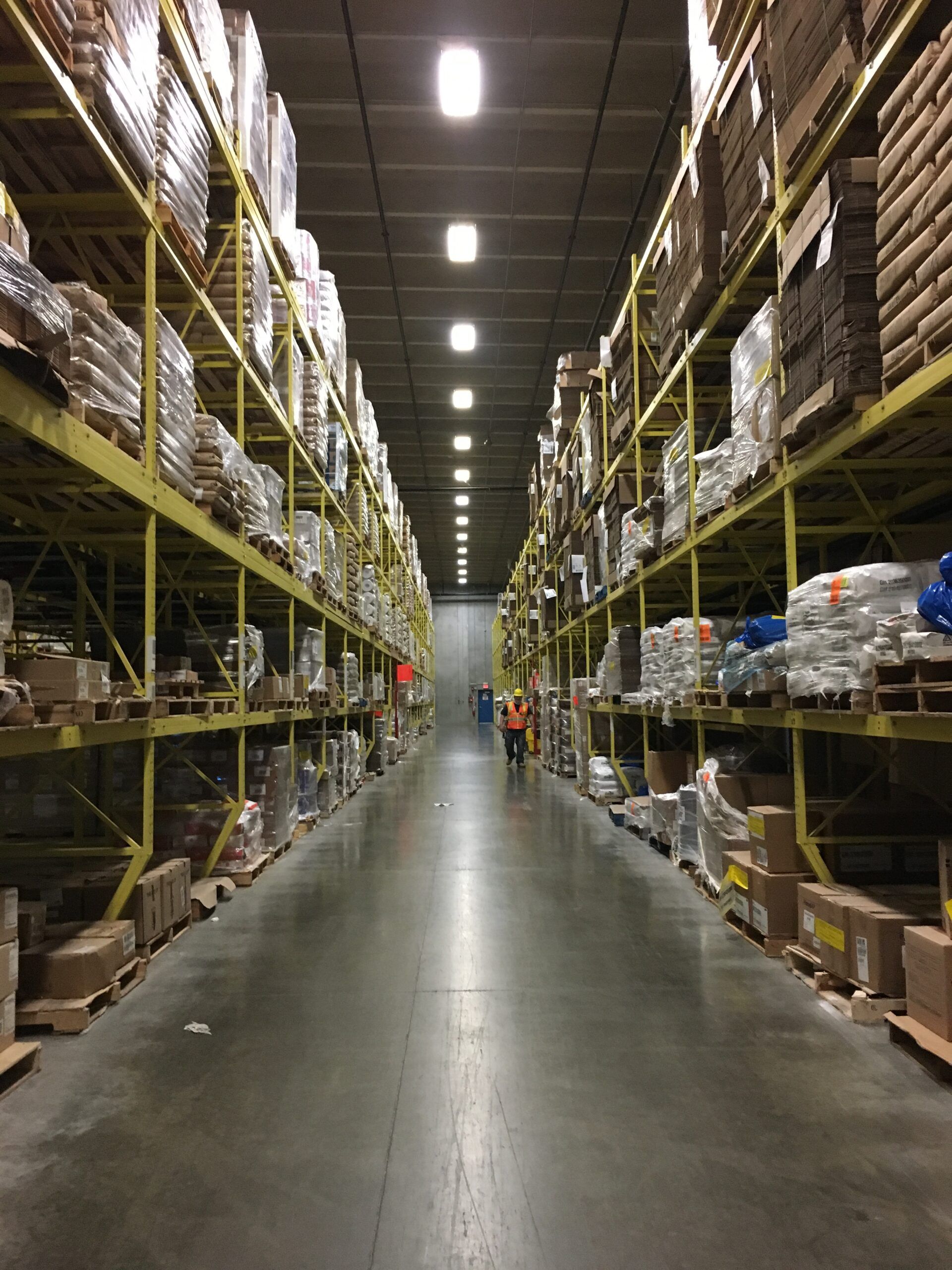 A warehouse filled with lots of shelves and boxes.