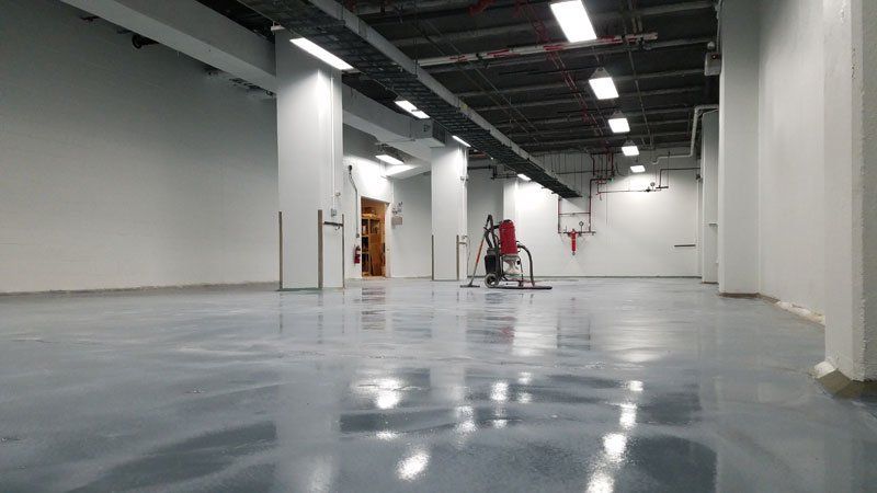 concrete floor cleaning in progress