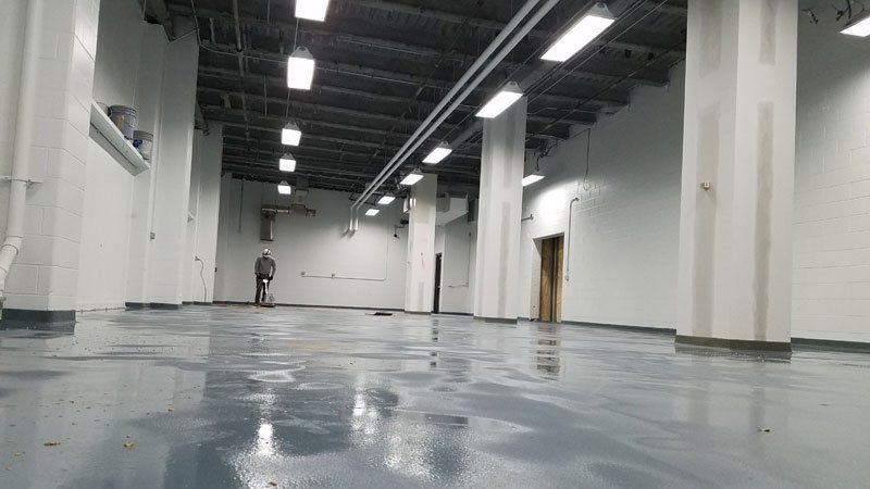 concrete floor cleaning in progress