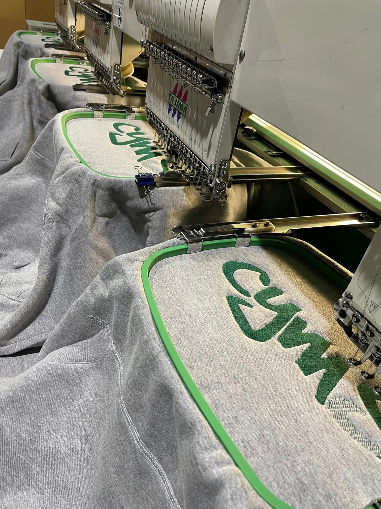 Cool Grey Sweatshirt on an Embroidery Machine— Screen Printer in Dubbo, NSW
