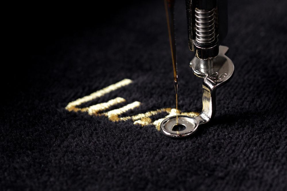 Embroidering on black fabric to create a stunning design — Screen Printer in Dubbo, NSW