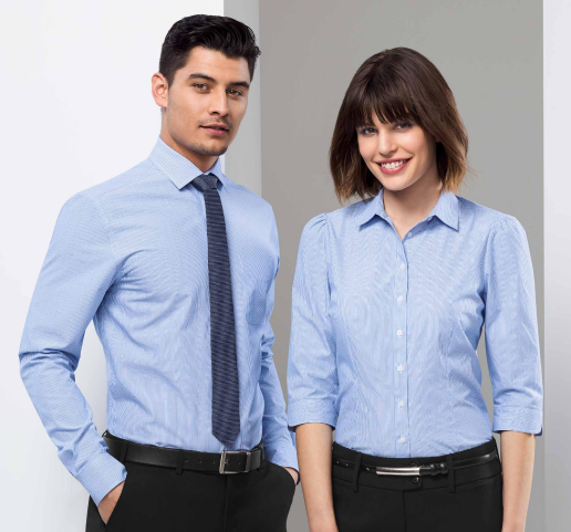 Man And Woman Wearing Blue Corporate Outfit — Screen Printer in Dubbo, NSW
