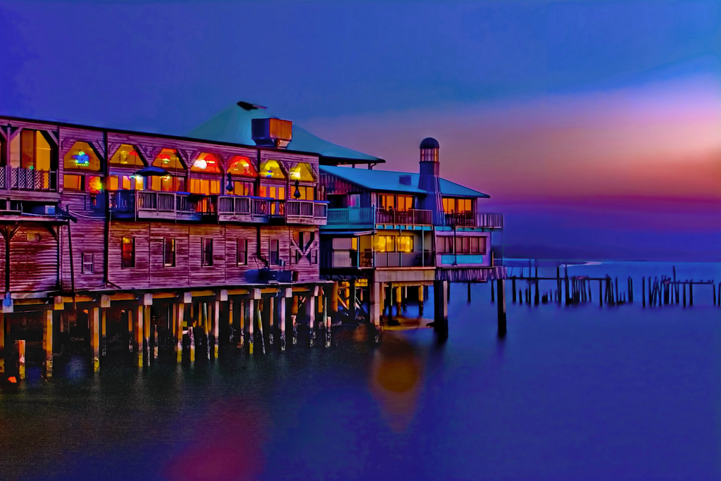 A Dock With A Sunset In The Background - Circle Dunnellon, FL - Rainbow Springs Realty Group
