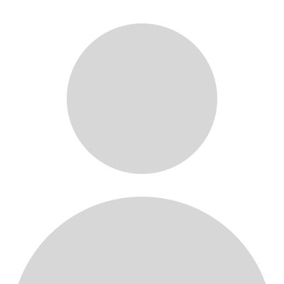 A gray circle with a person 's face in it on a white background.
