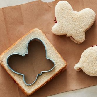 cookie cutters cutting out shape in bread